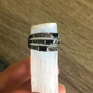 Silver ring set w/ black stones